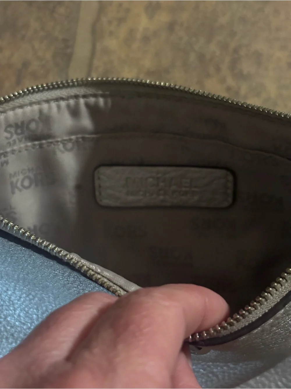 Michael Kors Gray Metallic Interior Wristlet
